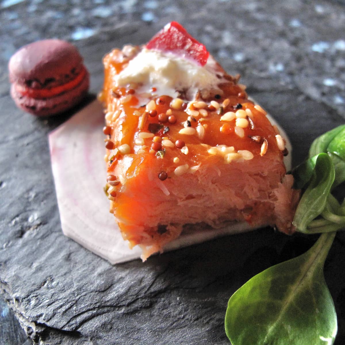 beet-macaron-salmon-horseradish smoked salmon steak with a mini purple macaron